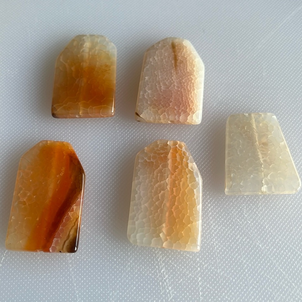 Uruguay, Mexican fire agate. Five pieces. Hand carved and polished.